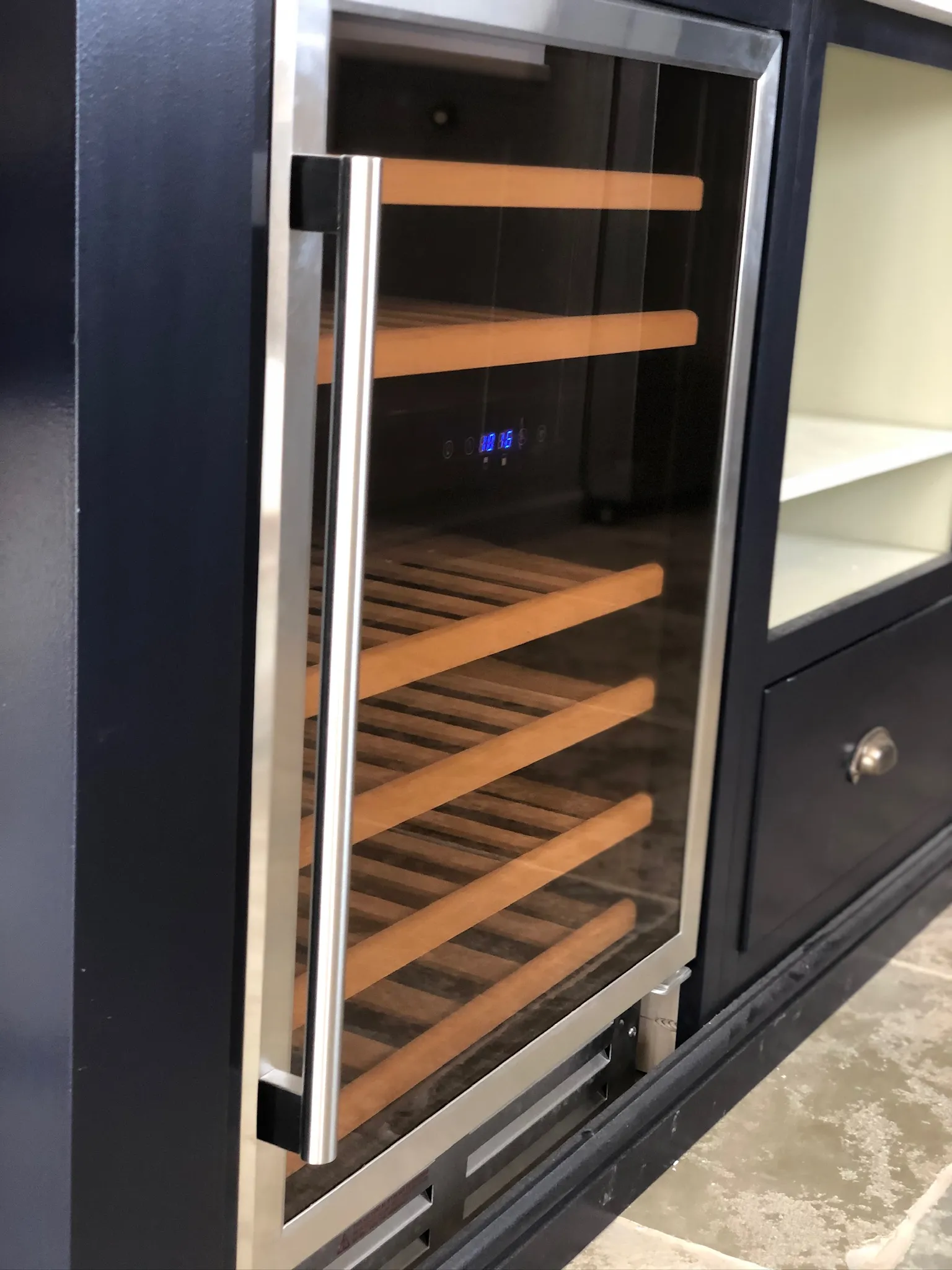 A black and silver oven with a glass door.